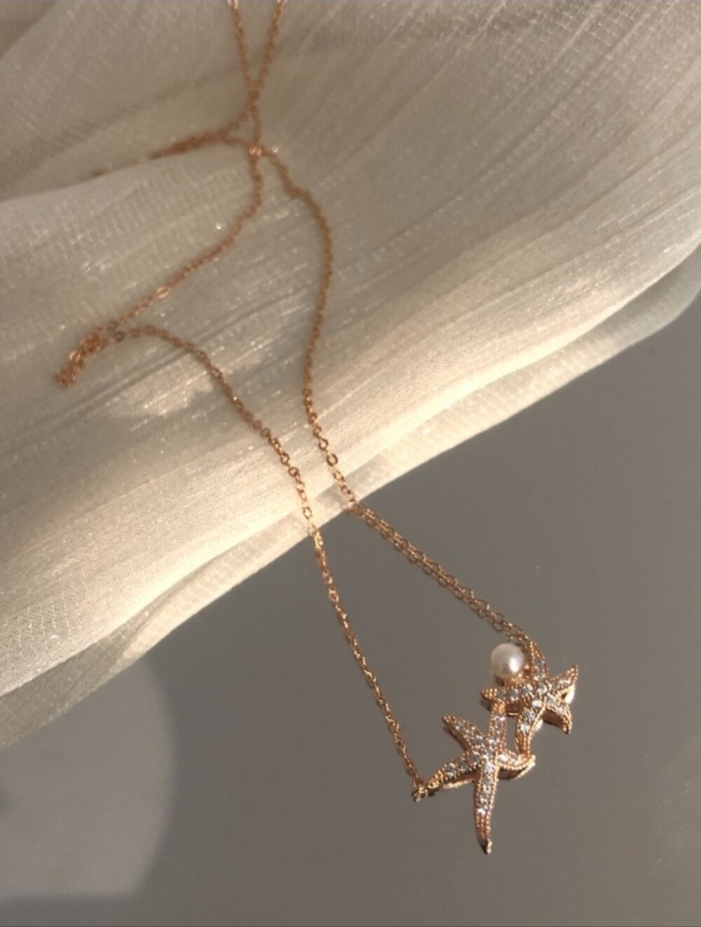Rose Gold Starfish Pendant Necklace with Pearl Accent
